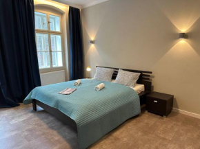 Grand Pupp Apartment with Jacuzzi and Netflix by Rentez